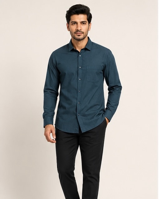Forest Linen Shirt, worn open over a cream tee